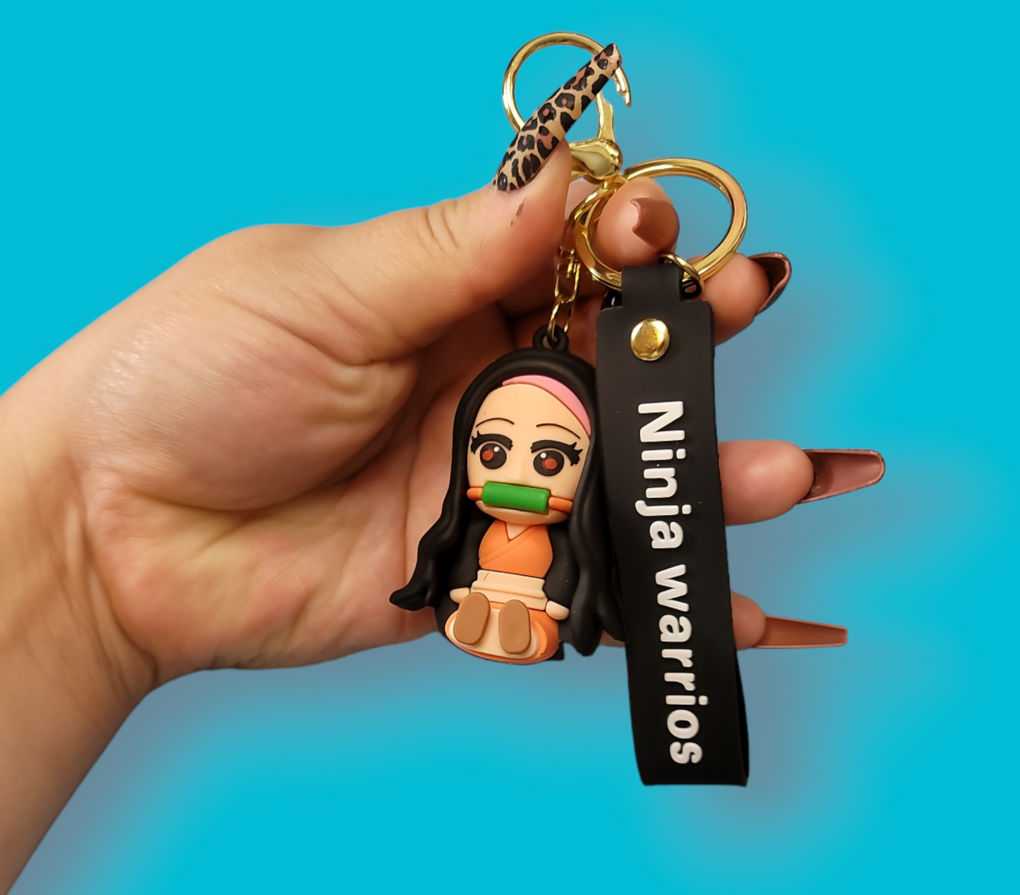 Seating Nezuko Kamado Keychain.